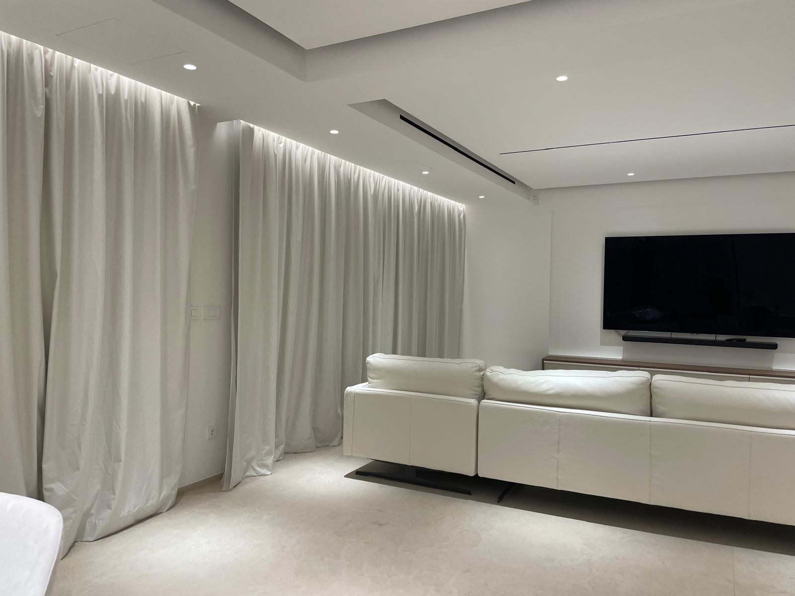 Light-filled interiors in Marfil Matt